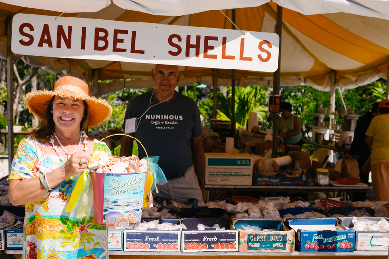 Shelle Kelle with her homemade shell bucket advertising the 81st annual Sanibel Shell Show.